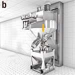混合过程结束后，混合机处于上部位置 (b)。