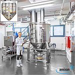 amixon® 锥形混合机 AM 2000 和左侧的就地清洗装置。